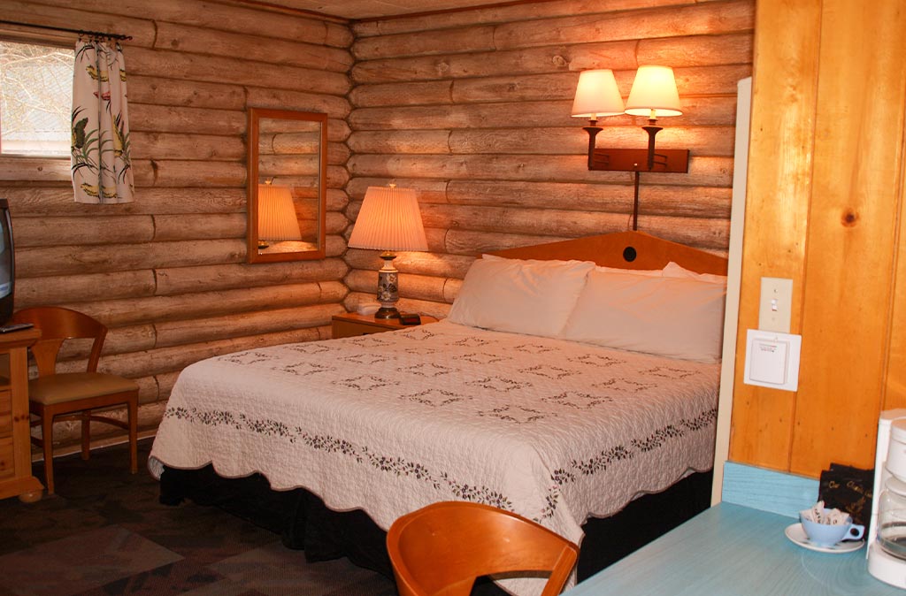 Cozy Bed at Island Acres Resort Motel
