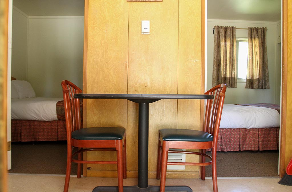 Seating for two in a two bedroom accommodation at Island Acres Resort Motel