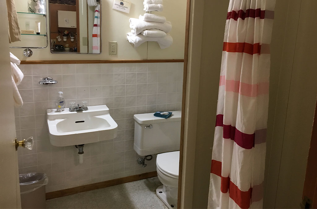 Photo of bathroom in two-bedroom kitchenette unit at Island Acres Resort Motel